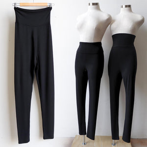 Super comfortable jeggings made with an ultra-wide waistband for all day wear. Made from double-stretch luxe bamboo rayon/spandex, for active wear or to layer beautifully under dresses and basics. Black.