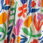 Colorful folk art floral pattern on a white background
