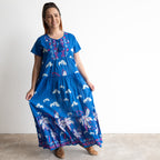 Blue cotton summer maxi dress with white palm threes and magenta pink sketch detail.