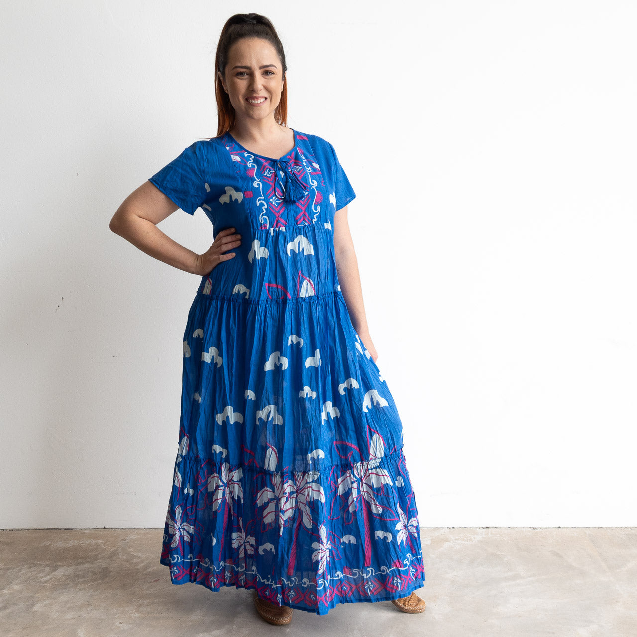 Blue cotton summer maxi dress with white palm threes and magenta pink sketch detail.
