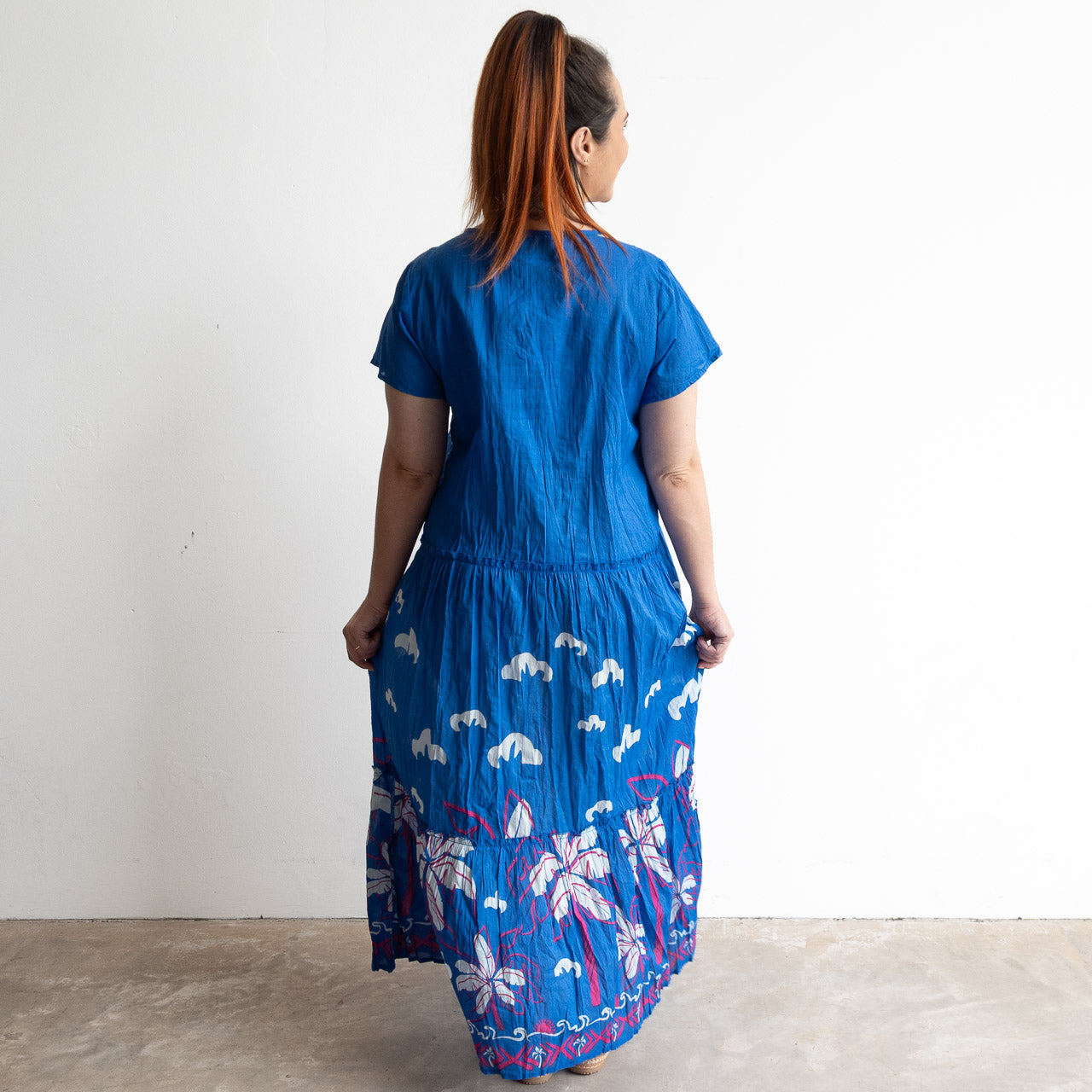 Blue cotton summer maxi dress with white palm threes and magenta pink sketch detail.