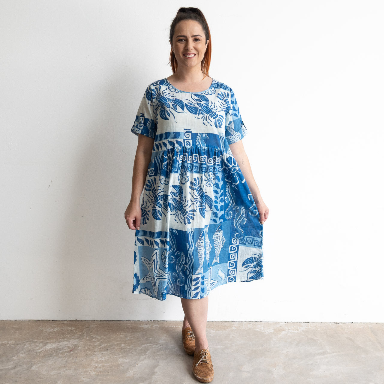 Blue and white cotton print summer smock dress with sea life illustration artwork