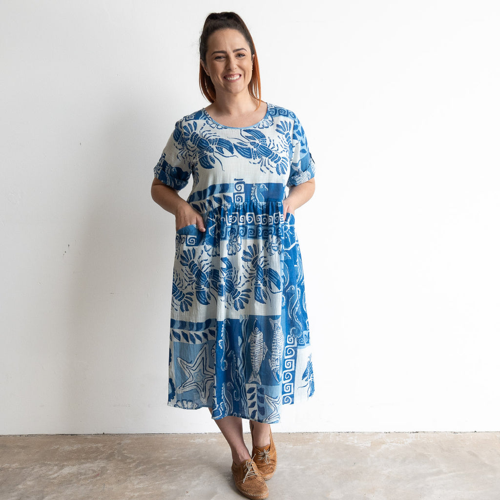 Blue and white cotton print summer smock dress with sea life illustration artwork