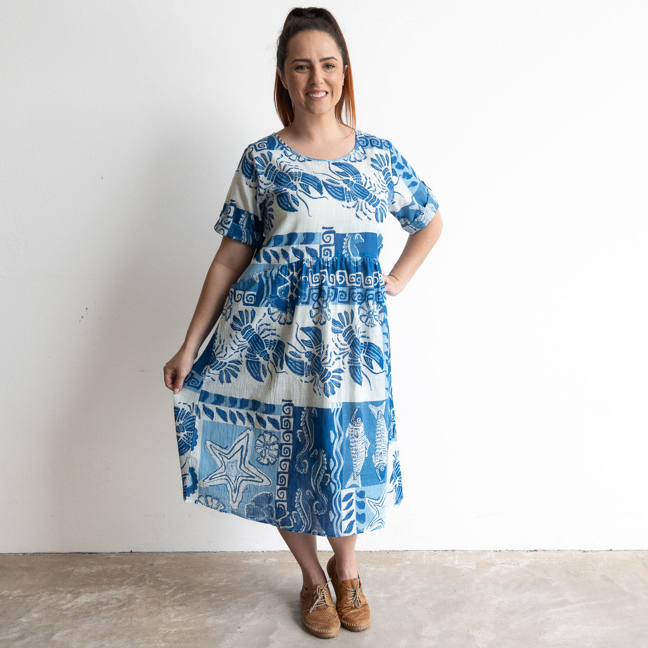 Blue and white cotton print summer smock dress with sea life illustration artwork