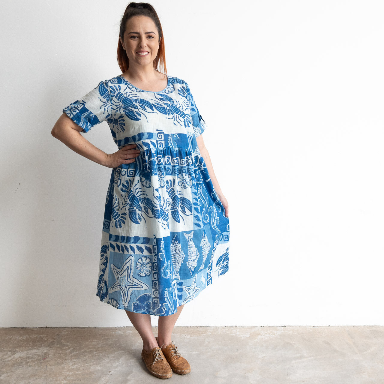 Blue and white cotton print summer smock dress with sea life illustration artwork