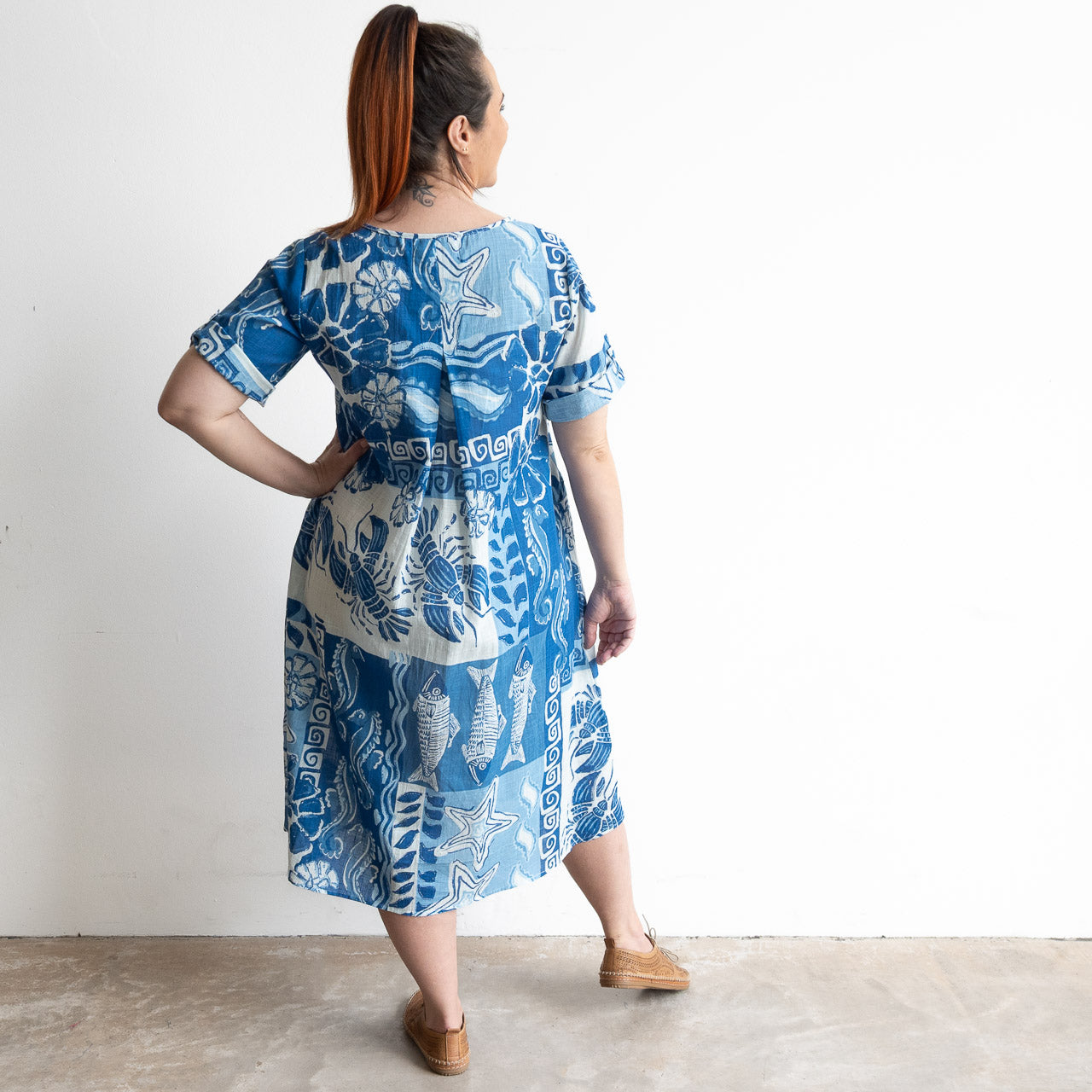 Blue and white cotton print summer smock dress with sea life illustration artwork
