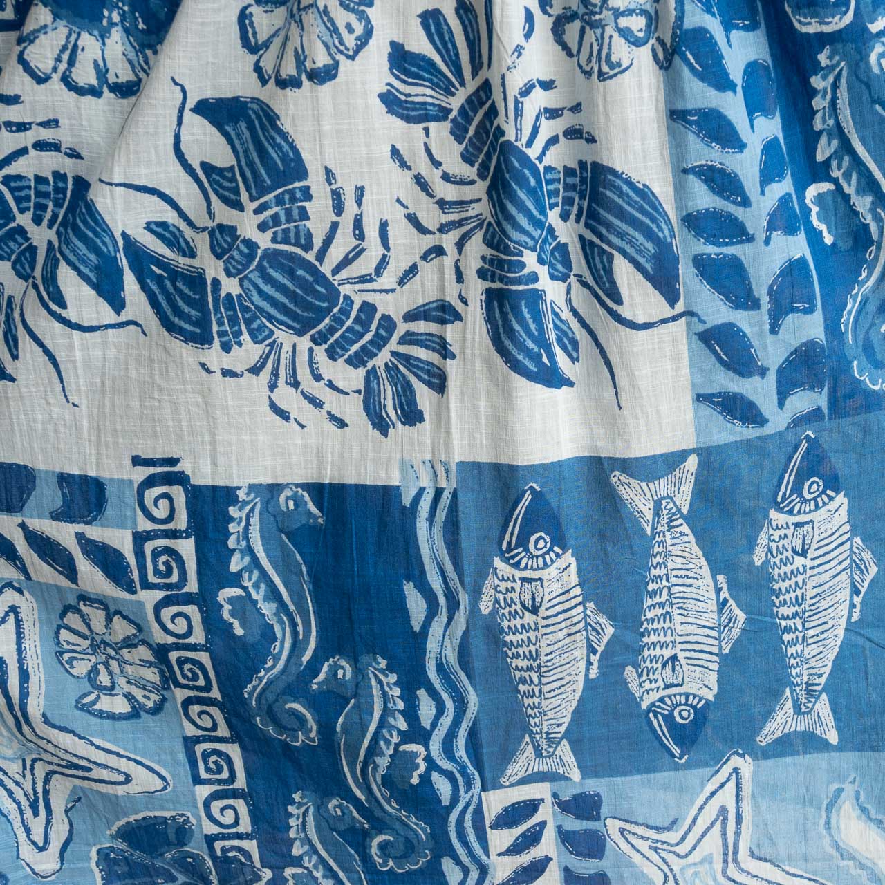 Blue and white cotton print summer smock dress with sea life illustration artwork