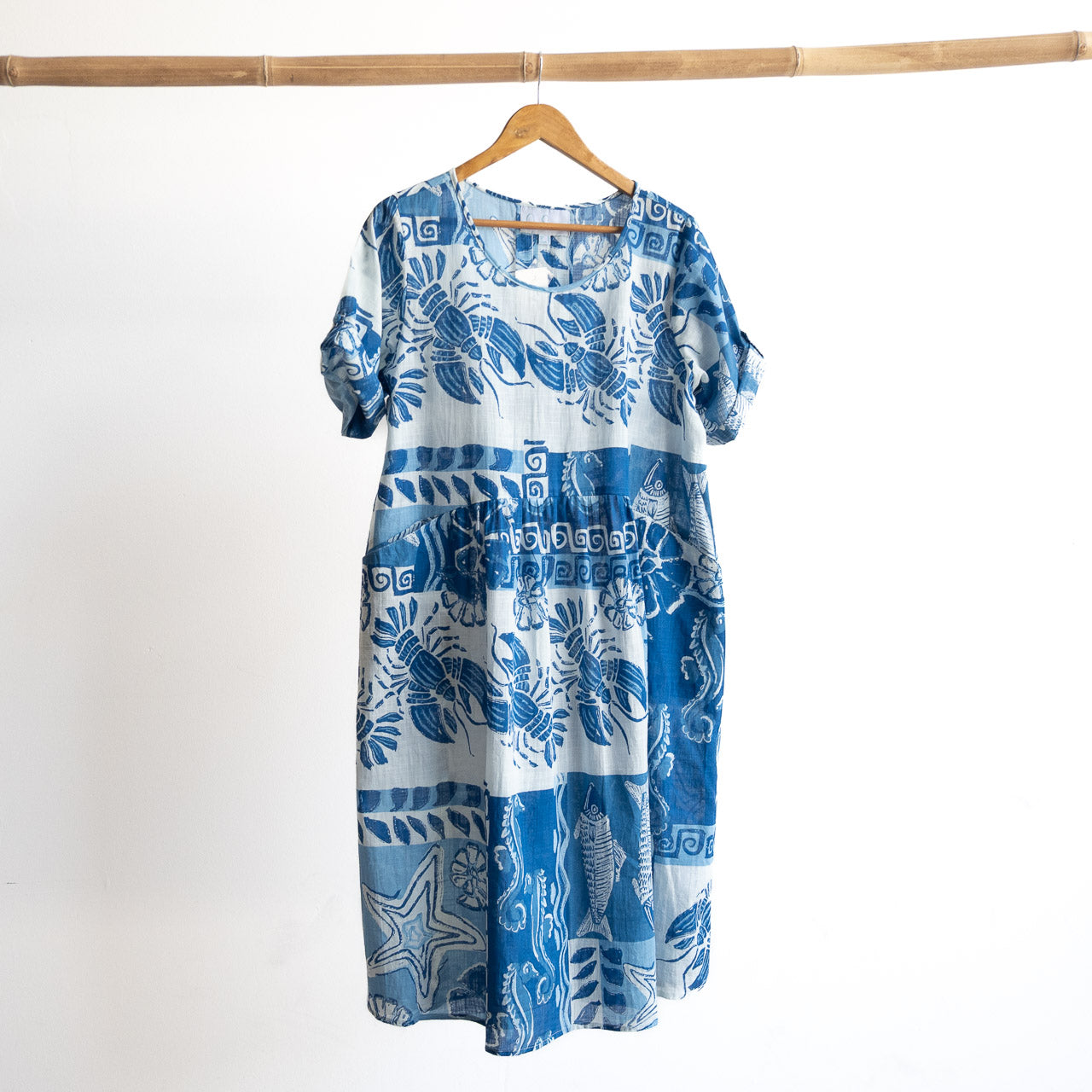 Blue and white cotton print summer smock dress with sea life illustration artwork