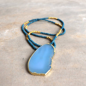 Stunning glass and stone statement necklace with gold metallic hightlights. Marine Blue.