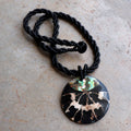 By The Sea Shore Necklace made with mother-of-pearl and glass beads in a tortoise shell pattern