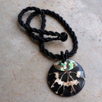 By The Sea Shore Necklace made with mother-of-pearl and glass beads in a tortoise shell pattern