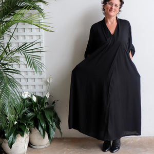 Apres Spa Kaftan Dress in classic black. Front view with pockets.