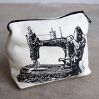 Cotton canvas printed zipper bag. Perfect for keys, sunglasses or loose change.
