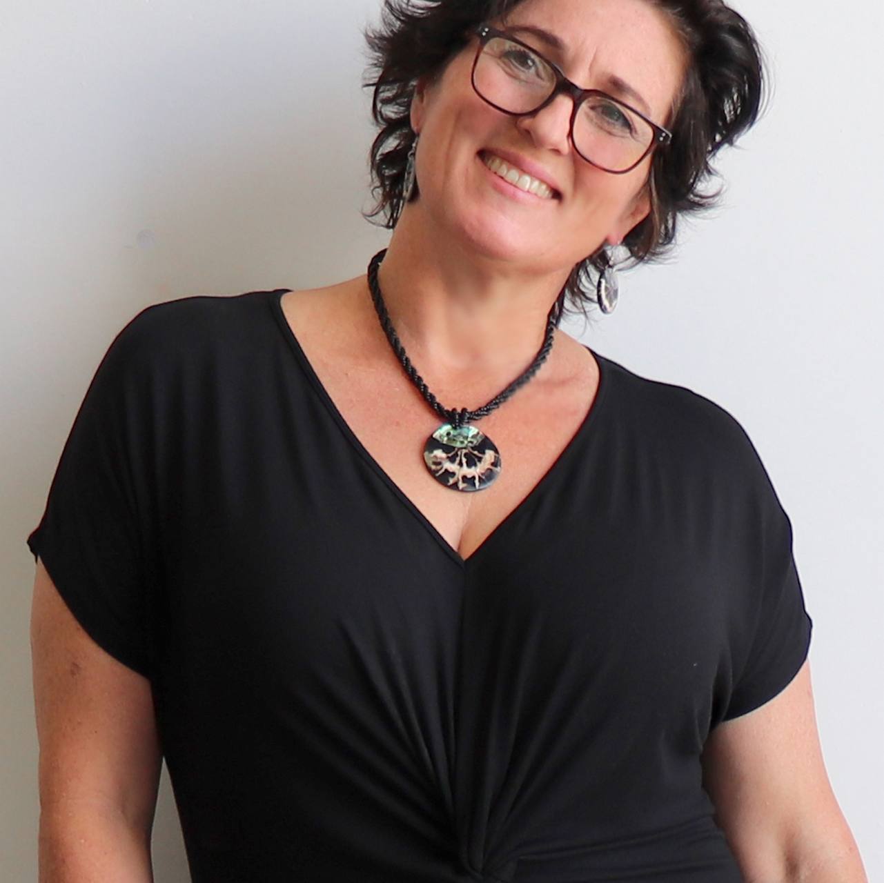 By The Sea Shore Necklace made with mother-of-pearl and glass beads in a tortoise shell pattern