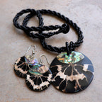 By The Sea Shore Necklace made with mother-of-pearl and glass beads in a tortoise shell pattern