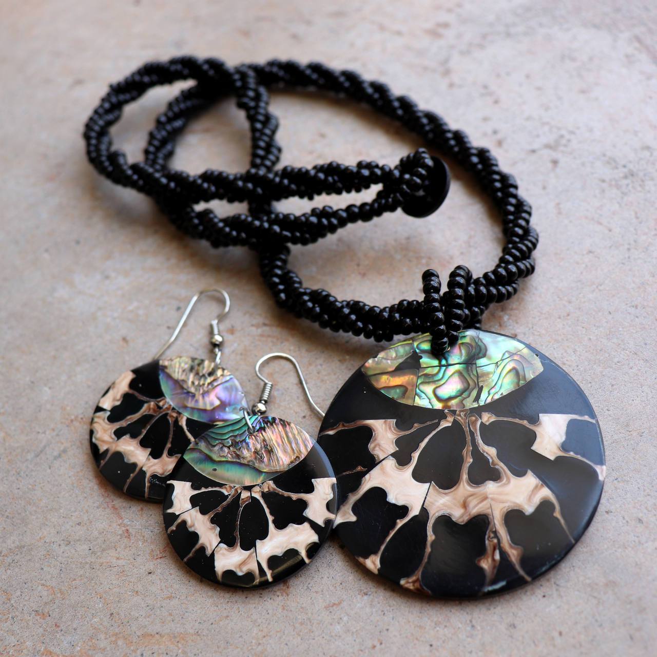 By The Sea Shore Necklace made with mother-of-pearl and glass beads in a tortoise shell pattern