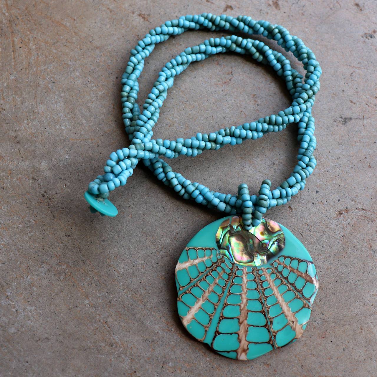 By The Sea Shore Pendant Necklace made with mother-of-pearl and glass beads in turquoise 