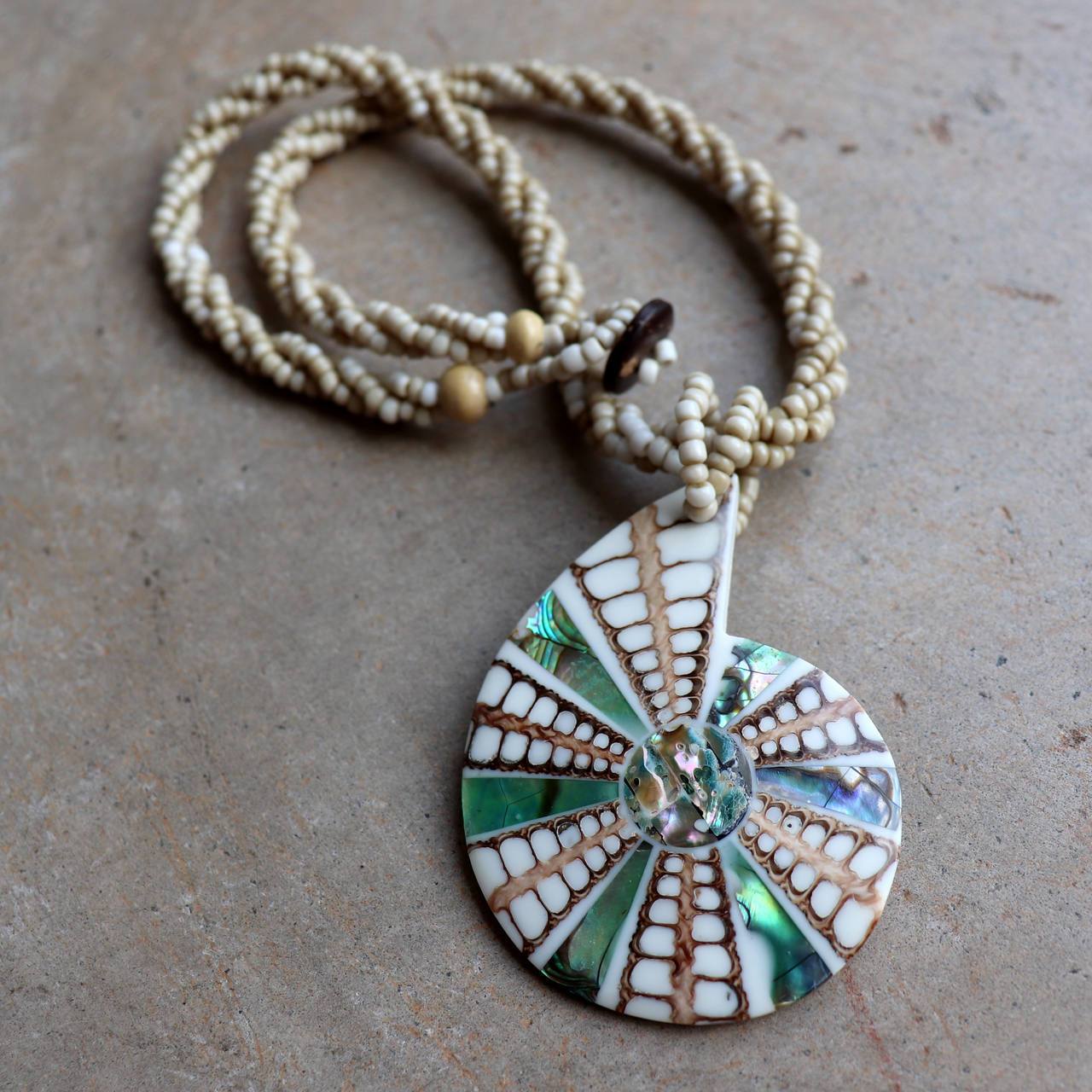 By The Sea Shore Pendant Necklace made with mother-of-pearl and glass beads in shell shape