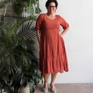 Womens below the knee summer dress is fully lined with side seam pockets. Chic + classic a-line shaping ,made with a lightly textured 65%-35% cotton/poly blend. Sizes 8/10 to 18/20. Desert.
