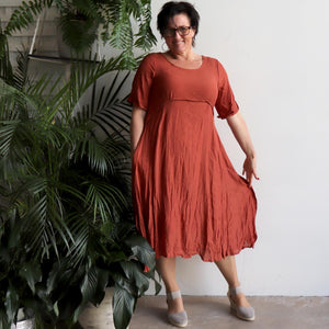 Womens below the knee summer dress is fully lined with side seam pockets. Chic + classic a-line shaping ,made with a lightly textured 65%-35% cotton/poly blend. Sizes 8/10 to 18/20. Desert.