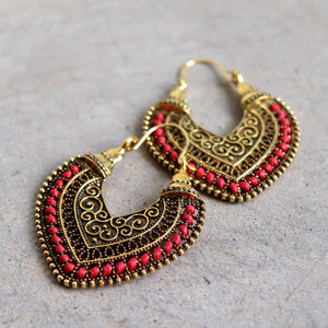 Brass filigree earrings with linen thread colour wrap details. Heart-Red.