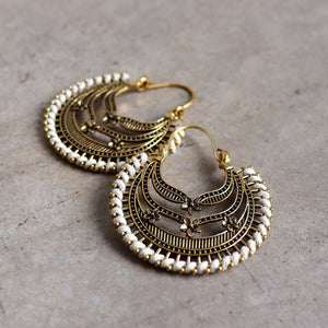Brass filigree earrings with linen thread colour wrap details. Moon-Flower-White.