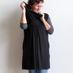 I'm Every Woman Sleeveless Tunic with Cowl Neck by Kobomo is ethically made fashion in bamboo fabric for plus size style. Black. Neck view.