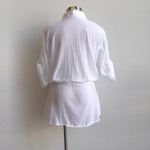Come on a Safari with me! Classic summer short-sleeved, button-through blouse in 100% cotton. White. Back view.
