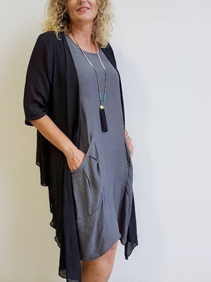 Make It Happen Long Layer Cardigan is a lightweight summer cover-up. Black.