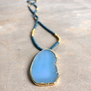 Stunning glass and stone statement necklace with gold metallic hightlights. Marine Blue.
