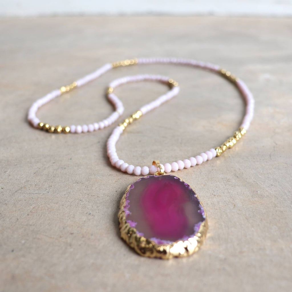 Stunning glass and stone statement necklace with gold metallic hightlights. Pink.
