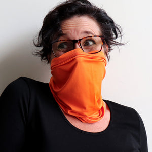 Protect-A-Neck Scarf Mask is a silky soft, stretchy poly/spandex tube scarf + face mask + headband. High-Vis Orange. Mask view.