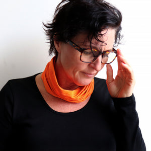 Protect-A-Neck Scarf Mask is a silky soft, stretchy poly/spandex tube scarf + face mask + headband. High-Vis Orange.