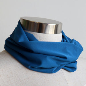 Protect-A-Neck Scarf Mask is a silky soft, stretchy poly/spandex tube scarf + face mask + headband. Sapphire Blue.