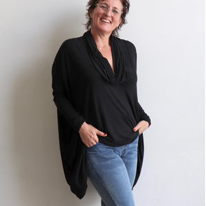 Our Glider Poncho Tee made in bamboo is a cowl neck plus size winter kaftan top. Black and denim.