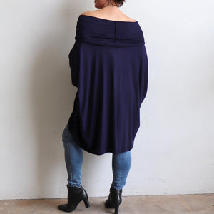 Our Glider Poncho Tee made in bamboo is a cowl neck plus size winter kaftan top. Navy blue. Back off the shoulder view.