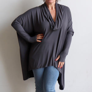 Our Glider Poncho Tee made in bamboo is a cowl neck plus size winter kaftan top. Charcoal Grey.