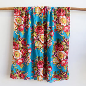 Vintage Floral Scarf is a handmade 100% cotton retro print accessory or sarong wrap. Aqua Blue. Full view.