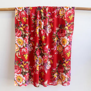 Vintage Floral Scarf is a handmade 100% cotton retro print accessory or sarong wrap. Red. Full view.
