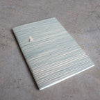32 blank page notebook. 10cm x 14cm dimensions.