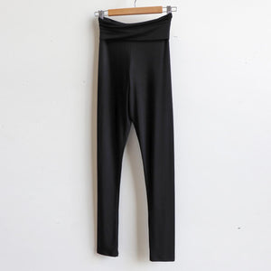 Super comfortable jeggings made with an ultra-wide waistband for all day wear. Made from double-stretch luxe bamboo rayon/spandex, for active wear or to layer beautifully under dresses and basics. Black.