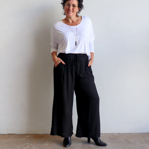 Zen Drawstring Lounge Pants - Classic black wide-leg, pull-on trousers in plus-size fitting.